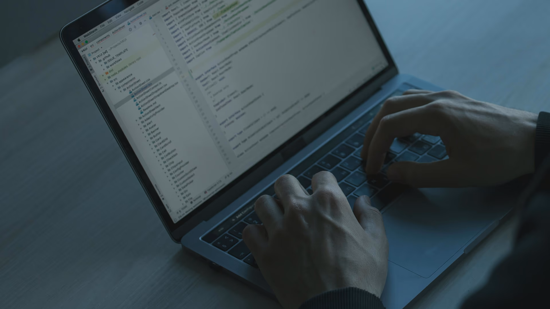 A person typing code on a laptop with a focus on cybersecurity and software development - Image by cottonbro studio from Pexels