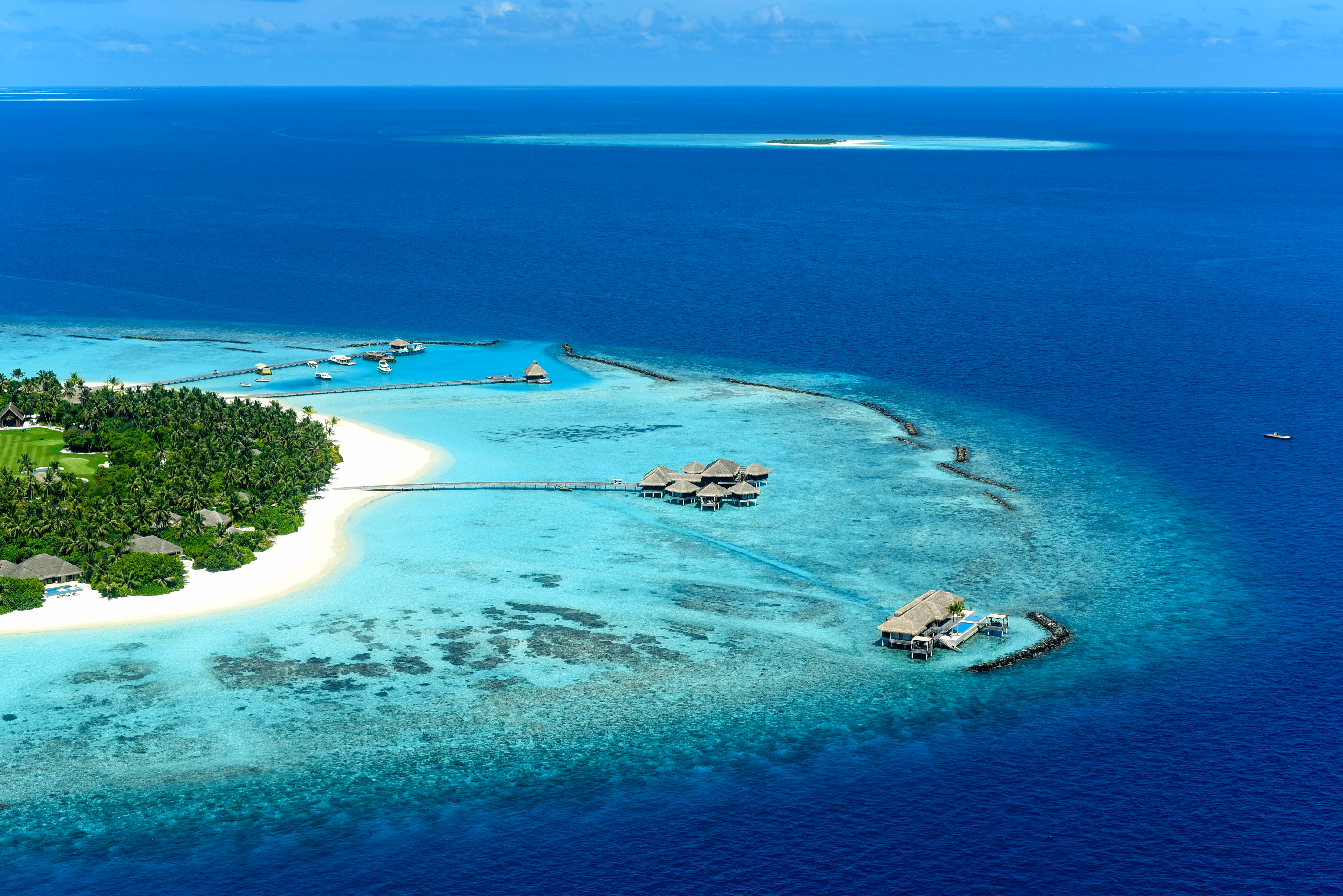 Breathtaking aerial view of a secluded Maldivian island with white sandy beaches and turquoise waters - Image by  Asad Photo Maldives from Pexels