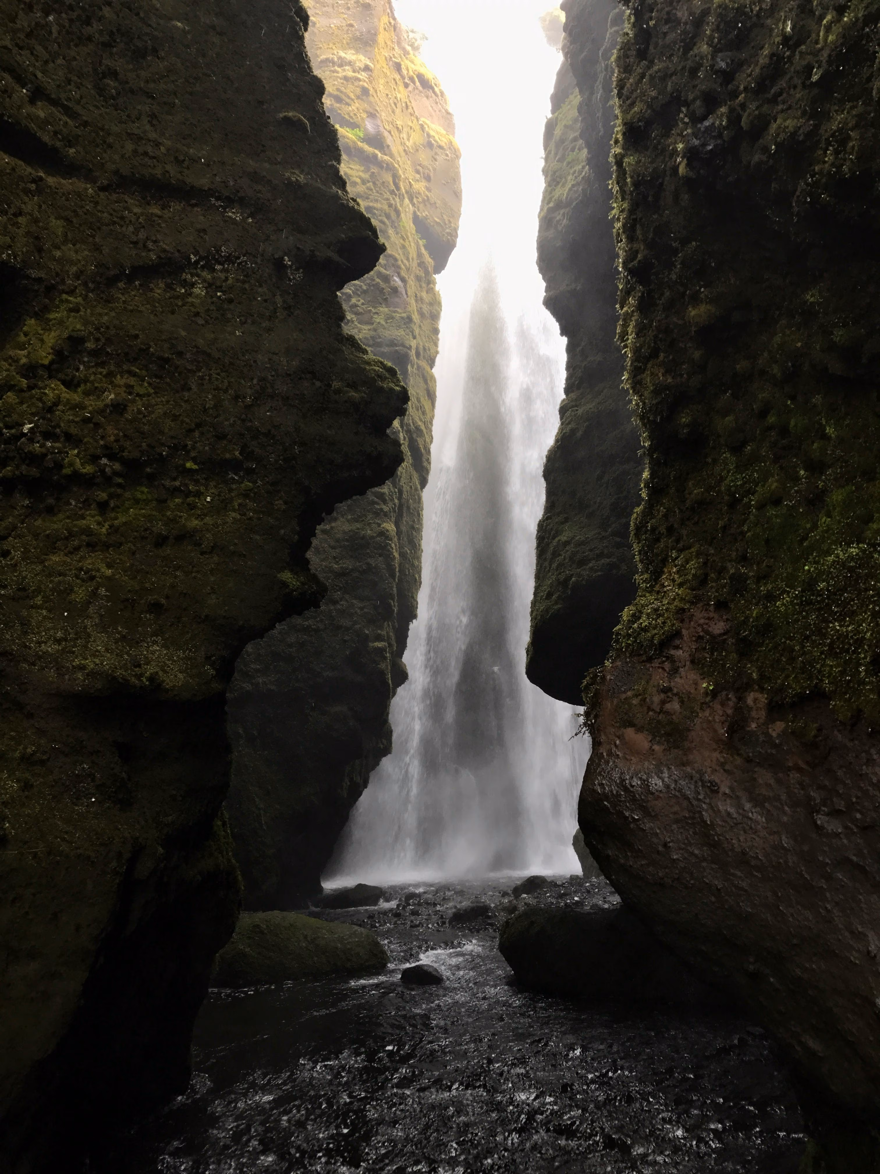 Discover the pristine beauty of a hidden Icelandic waterfall surrounded by moss-covered rocks - Image by ArtHouse Studio from Pexels