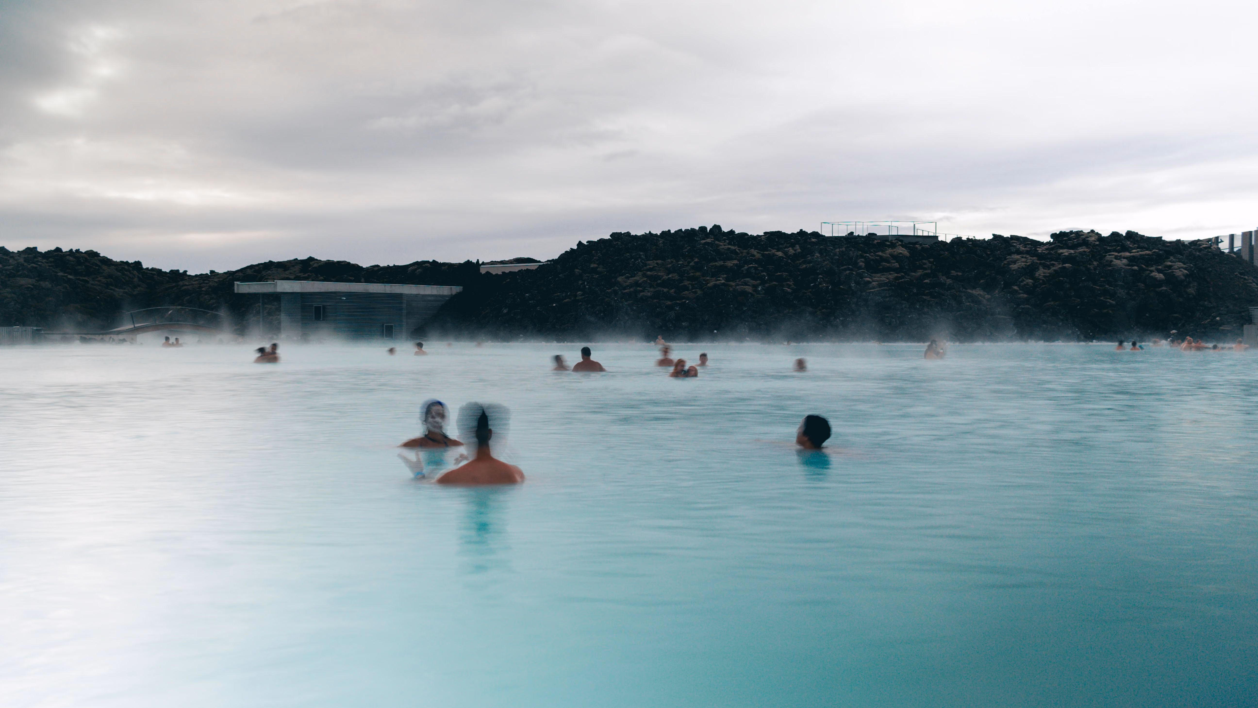 People enjoying relaxation and recreation in Iceland's soothing Blue Lagoon geothermal spa - Image by It's MJ! from Pexels